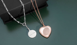 engraved sterling silver lariat necklace and rose gold fingerprint necklace in shape of a heart