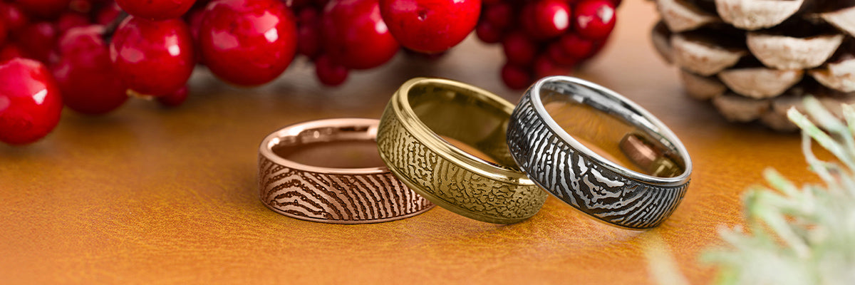 rose gold, yellow gold, and sterling silver fingerprint rings