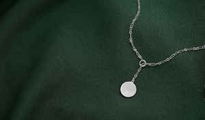 sterling silver lariat necklace engraved with a thumbprint