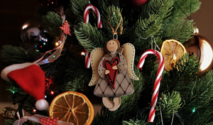 angel ornament on a christmas tree