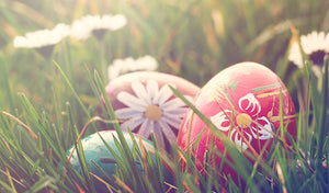 purple pink and green easter eggs painted with flowers