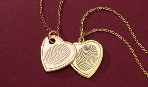rose gold offset heart fingerprint pendant necklace and yellow gold vertical heart fingerprint necklace