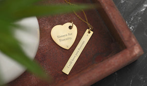 gold jewelry that is engraved with heartfelt quotes