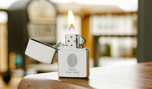 personalized zippo lighter engraved with a fingerprint along with the name "Charlie" and dates