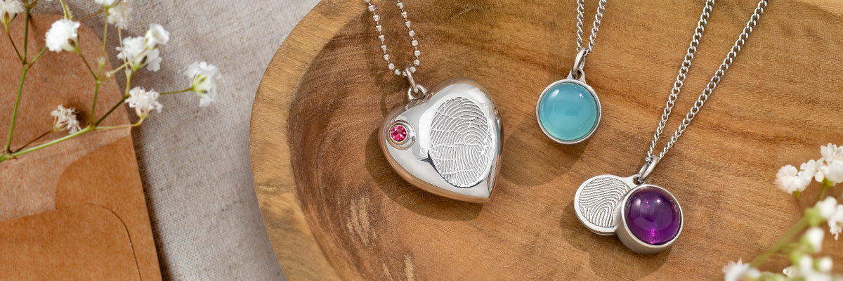 heart shaped urn pendant necklace engraved with a fingerprint and gemstone urn necklaces engraved with fingerprints
