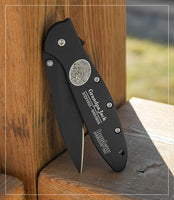 black Kershaw pocket knife personalized with a fingerprint, name, and dates